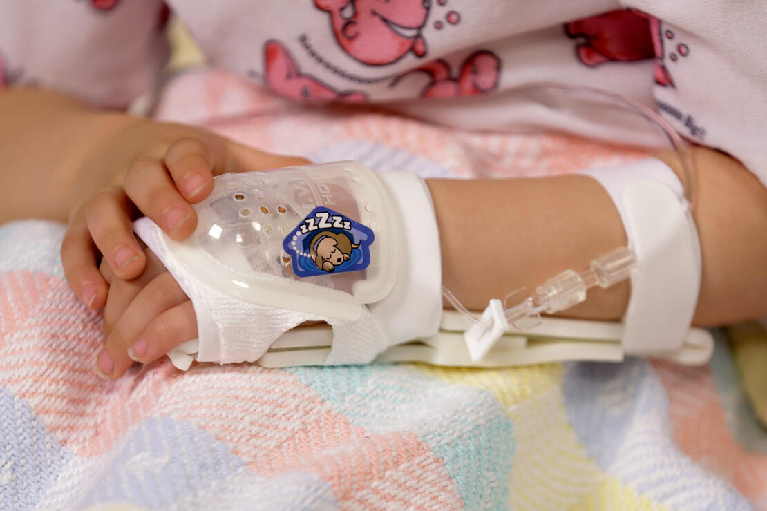 730S I.V. House UltraDressing on child's hand